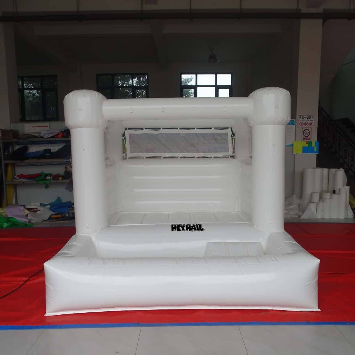 HEYHAIL white bounce house with front ball pit and mesh side walls, front view