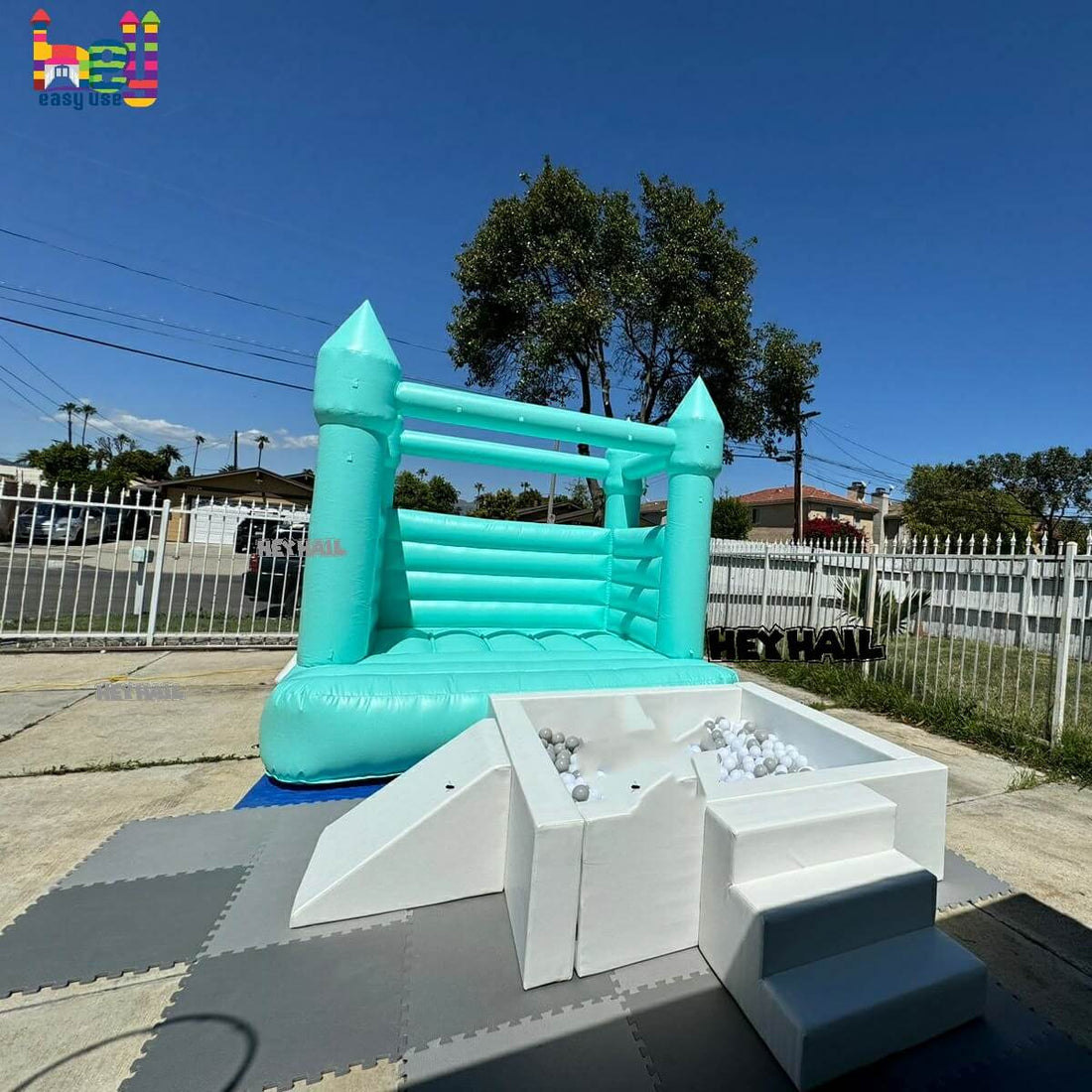 Aqua mini white bounce house review from USA softplay business