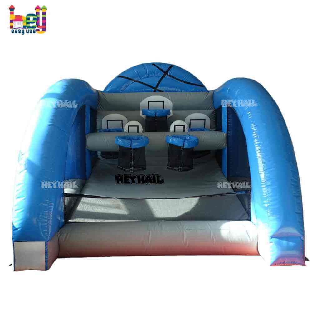 Blue-and-gray inflatable basketball game with three hoops viewed from the front