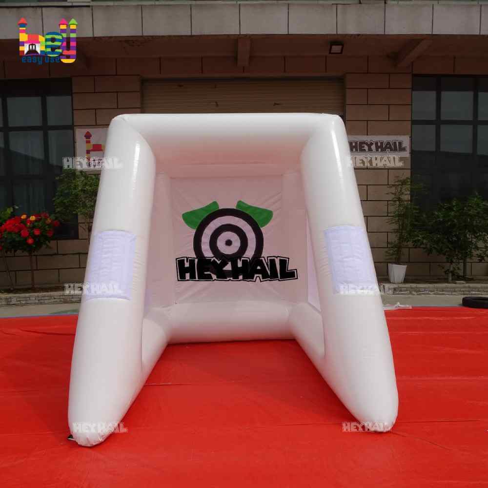 Front photograph of white inflatable target game with circular rear target