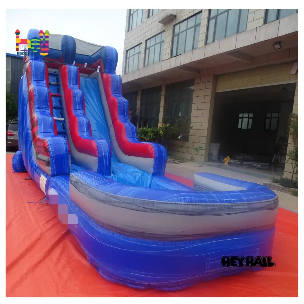 Outdoor front-left view of marble blue and marble purple 16ft single-lane water slide with attached pool