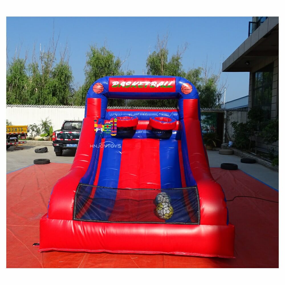 Front view of red-and-blue inflatable basketball shooting game with two hoops