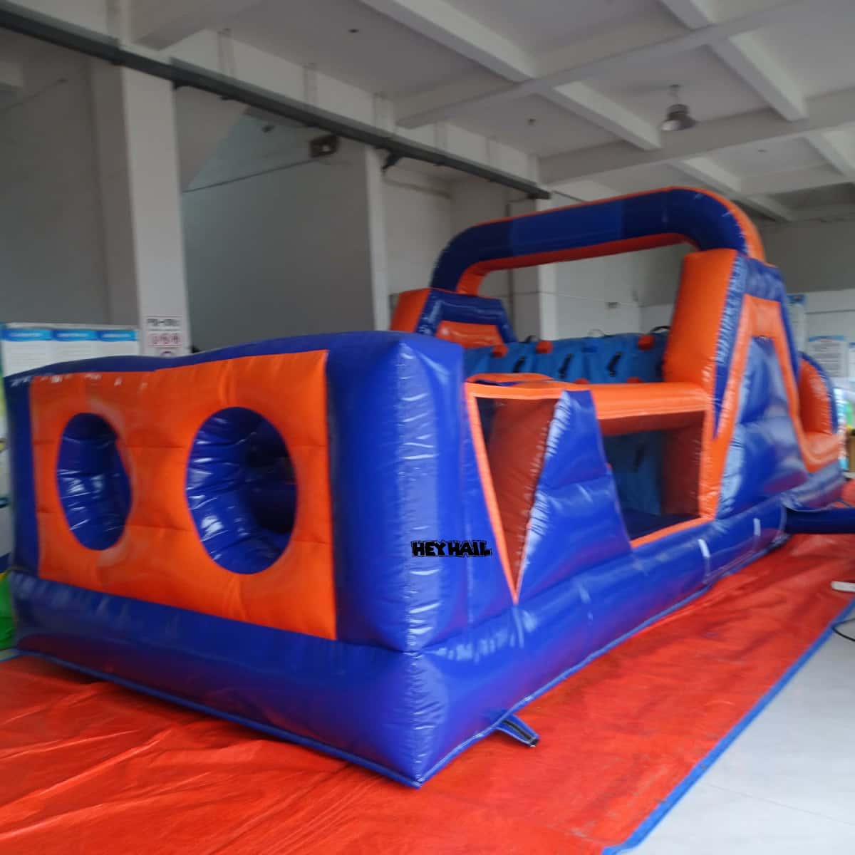 25ft blue and orange inflatable obstacle course front view