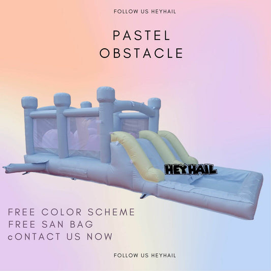 Pastel dual-lane inflatable obstacle course with slide and landing area