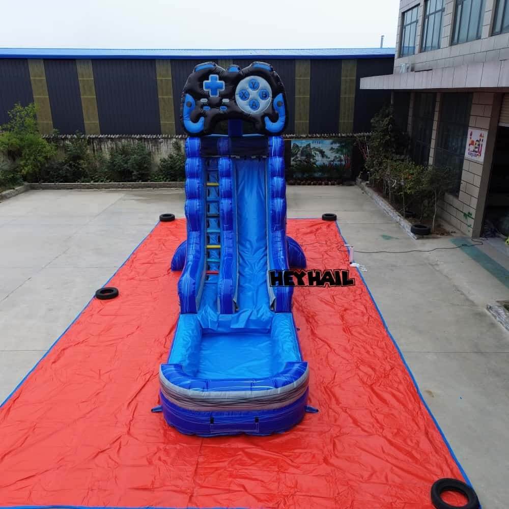 Front view of blue 20 foot single lane commercial water slide with climbing steps
