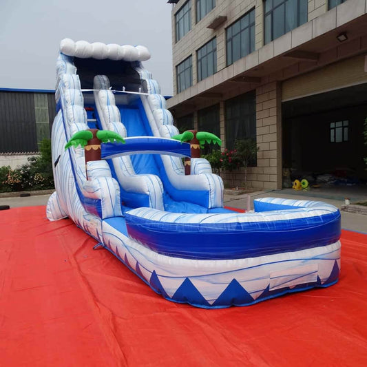 Front-right view of blue-and-white 18ft commercial inflatable water slide with splash pool