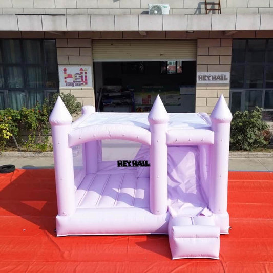 Front view of lavender 13 x 13 ft bounce house with slide