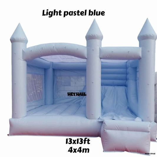 Front product graphic of light pastel blue bounce house with slide, castle turrets, and 13 x 13 ft size