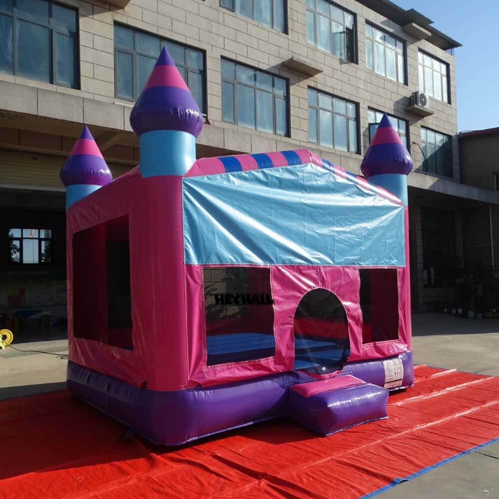 Pink 13 x 13 ft regular bounce house angled front view