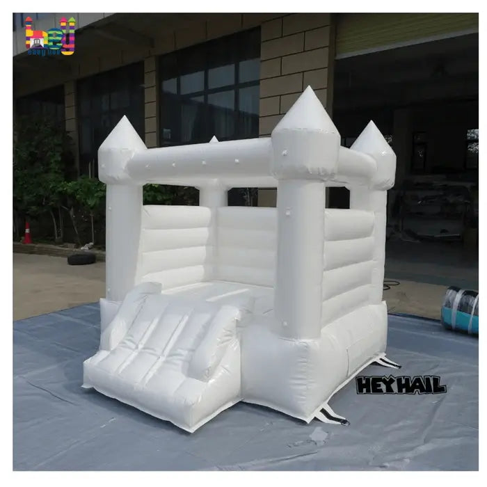 white bounce house with slide for sale
